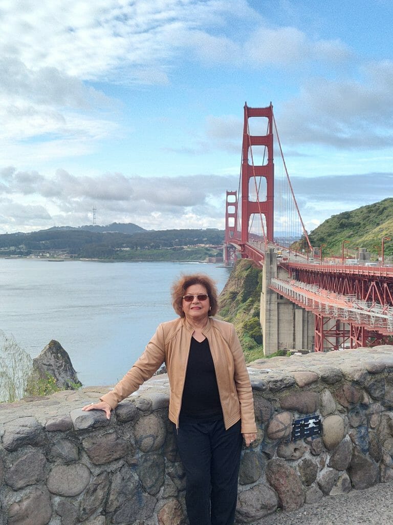 woman standing on Golden Gate Bridge